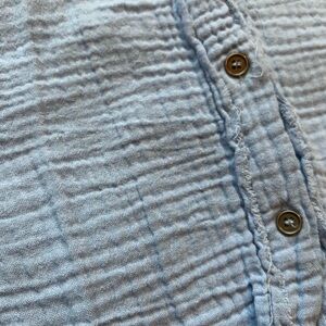 Women's periwinkle button down.